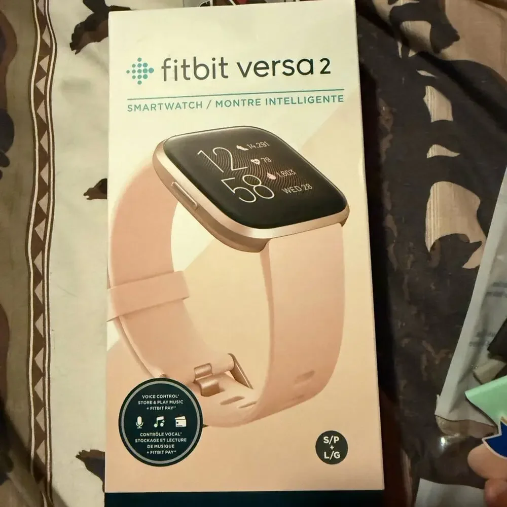 Pair of Fitbit Versa and Fitbit Versa 2, 2 chargers, 2 screen protectors, bands